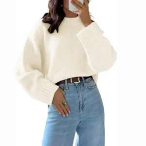 Beige crew neck sweater for women with ribbed cuffs and a relaxed knit fit