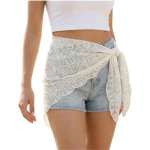 White sheer floral wrap skirt with asymmetrical lace hem and drawstring waist, styled as a Y2K outfit overlay.