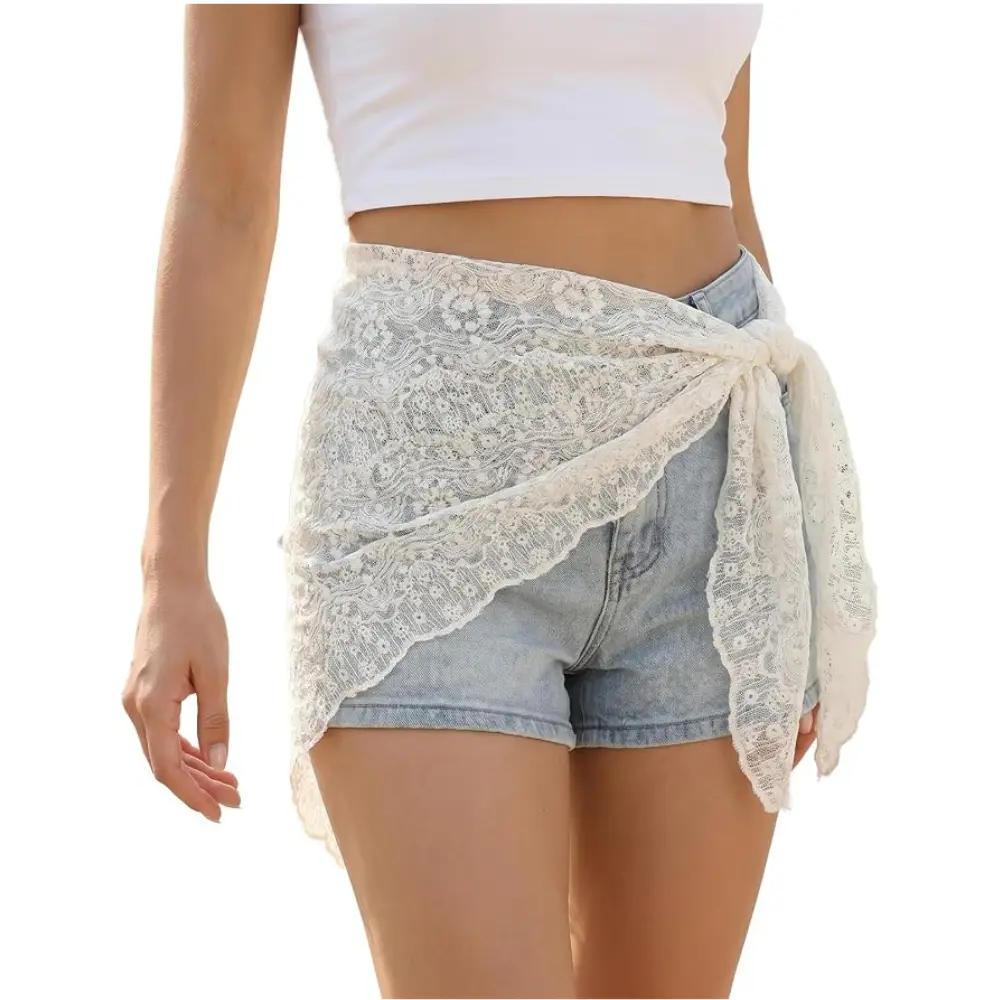 White sheer floral wrap skirt with asymmetrical lace hem and drawstring waist, styled as a Y2K outfit overlay.