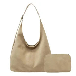 suede hobo Shoulder bag with adjustable strap and matching small pouch on white background